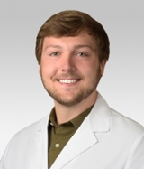 Trever Troutman, MD (he, him, his)
